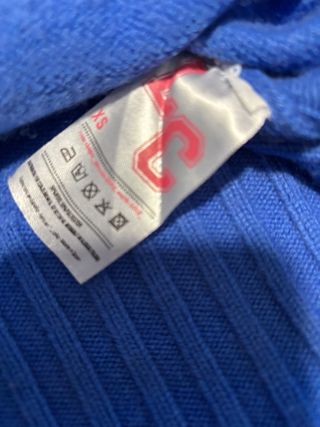 Jersey Lecruel azul con detalles naranja