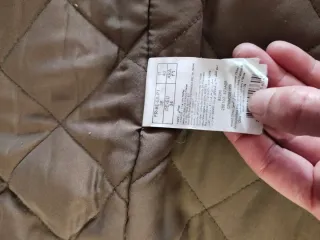 Parka verde niña con capucha y pelo