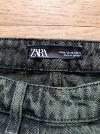 Falda midi vaquera desgastada