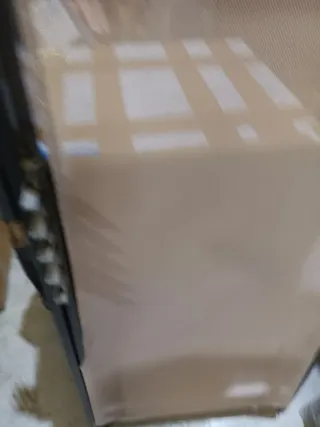 Tumbona de lona plastificada plegable