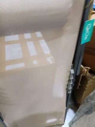 Tumbona de lona plastificada plegable