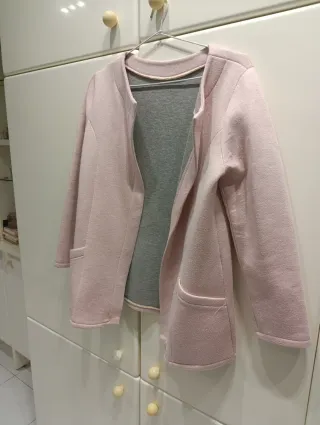 Chaqueta larga o abrigo corto rosa