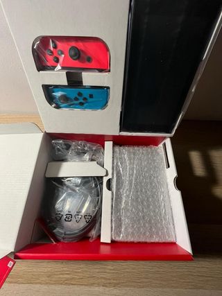 Nintendo Switch NUOVA SIGILLATA + Giochi + Custodie