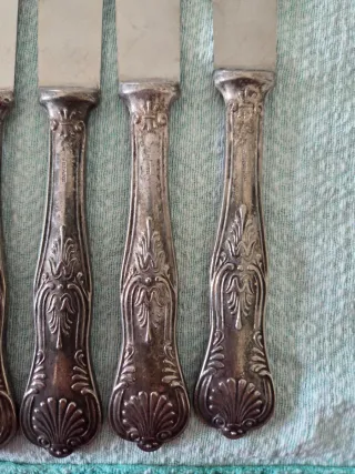 N.9 Coltelli Acciaio Manico Argento 800