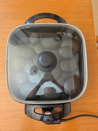 Olla y piedras para masaje