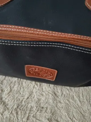 Bolsa de viaje azul y marrón