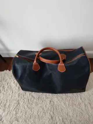 Bolsa de viaje azul y marrón