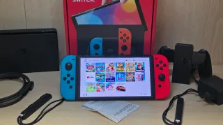 Nintendo Switch OLED Blu/Rosso con giochi inclusi