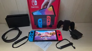 Nintendo Switch OLED Blu/Rosso con giochi inclusi