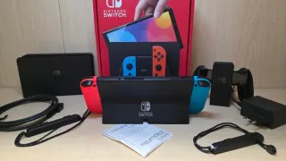 Nintendo Switch OLED Blu/Rosso con giochi inclusi