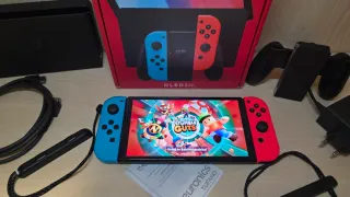Nintendo Switch OLED Blu/Rosso con giochi inclusi