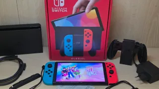 Nintendo Switch OLED Blu/Rosso con giochi inclusi