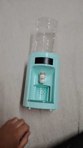 Dispensador de agua de juguete