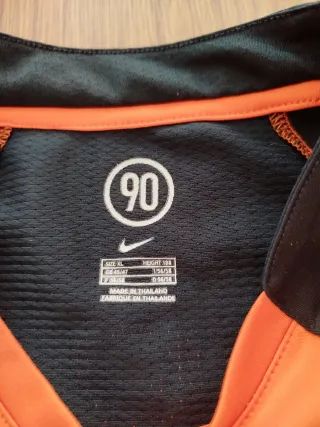 Camiseta deportiva Nike Naranja y Negra
