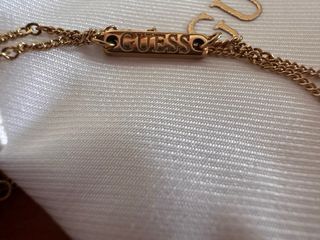 Colgante Guess con circonita