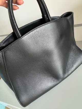 Borsa Coccinelle vera pelle nera con logo dorato