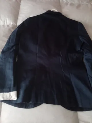 Americana azul marino con forro de rayas