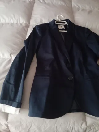 Americana azul marino con forro de rayas