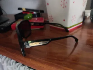 Gafas de sol Carrera negras y doradas