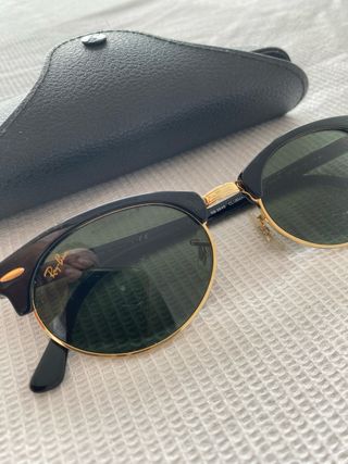 Gafas de sol Ray-Ban Clubmaster negras y doradas