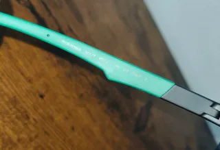 Occhiali da sole Polaroid neri e verdi