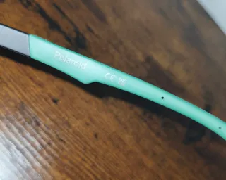 Occhiali da sole Polaroid neri e verdi