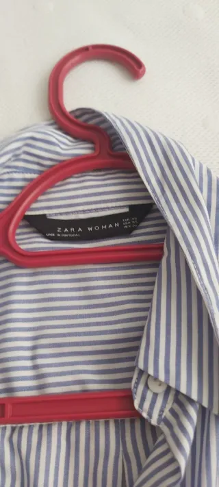 Blusa de rayas azul y blanco