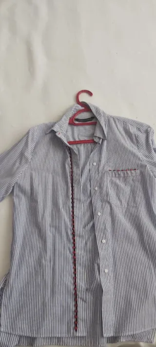 Blusa de rayas azul y blanco