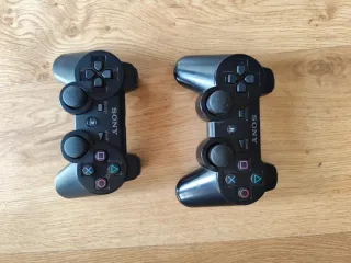 PlayStation 3 + accesorios SingStar y Buzz