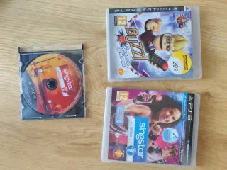 PlayStation 3 + accesorios SingStar y Buzz