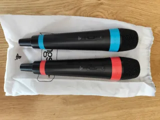 PlayStation 3 + accesorios SingStar y Buzz