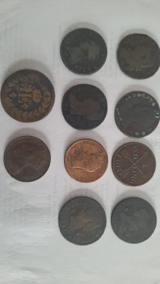 Colección monedas cobre antiguas de varios paises.