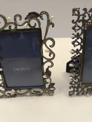 Cornice portafoto in metallo decorata