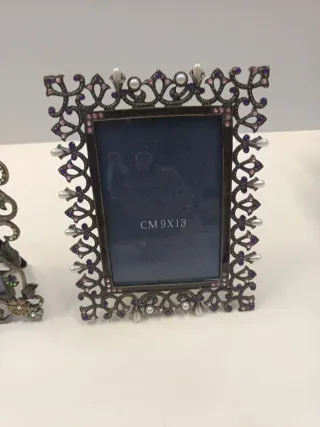 Cornice portafoto in metallo decorata