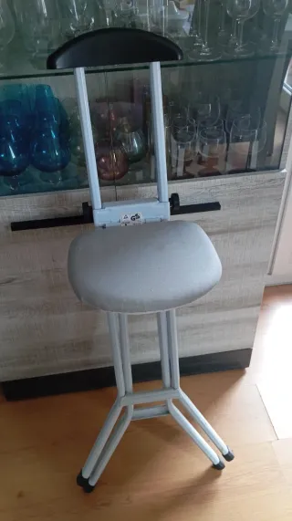 Silla de altura plegable.