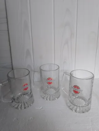 Tre boccali birra Heineken
