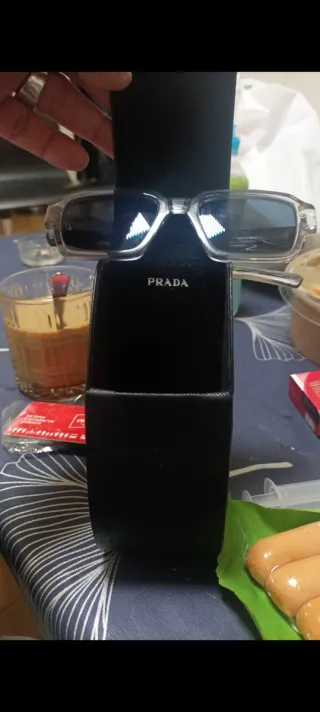 Gafas de sol Prada hombre grises