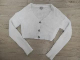 Chaqueta blanca niña cintura corta.