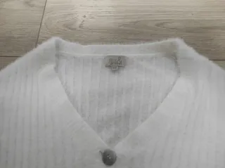 Chaqueta blanca niña cintura corta.