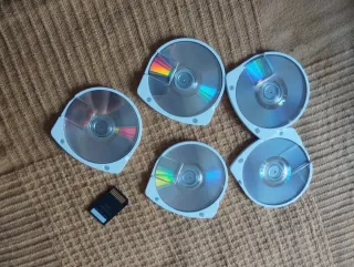 PSP Sony Rosa + 5 UMDs + Caricatore