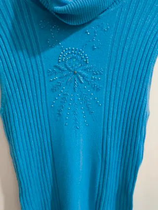 Jersey cuello alto sin mangas azul