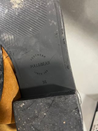 Botines planos con hebillas