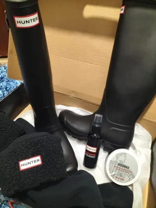 Bota henter original como nuevo poco uso .