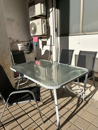 Mesa jardín de cristal y 4 sillas