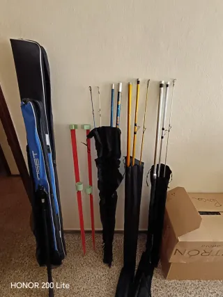 Conjunto de cañas,funda,picas, sacadera y carretes