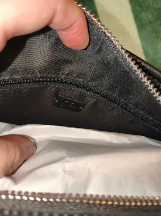 Bolso efecto piel y asa para hombro