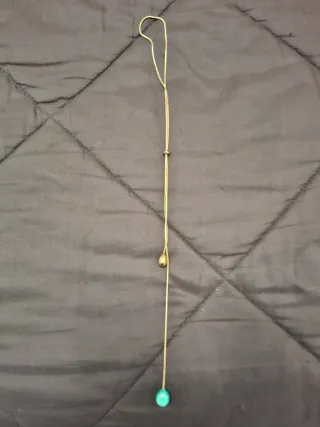 Collar largo dorado con colgante turquesa