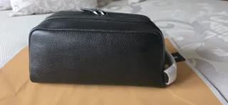 Neceser o bolso de mano hombre Michael Kors