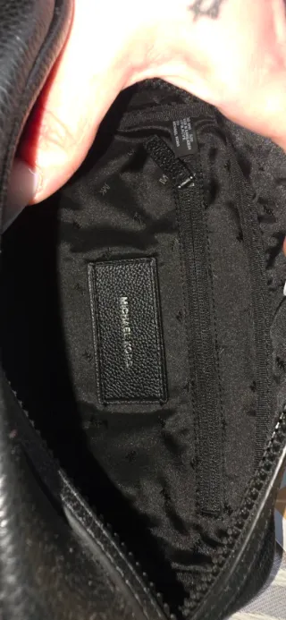 Neceser o bolso de mano hombre Michael Kors