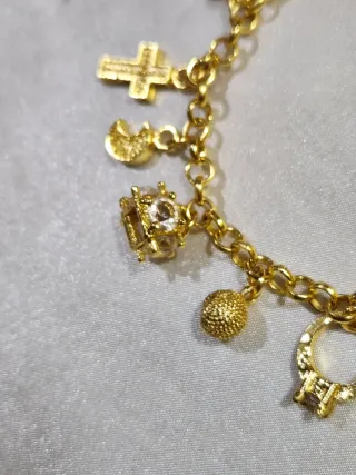 Pulsera chapada en oro 18 con charms